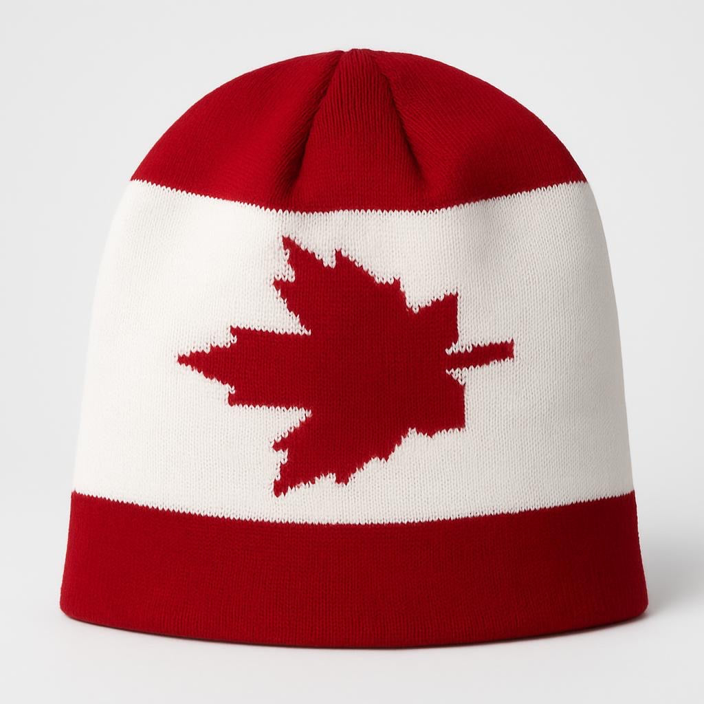 Red and white knit beanie with a maple leaf design on a white background