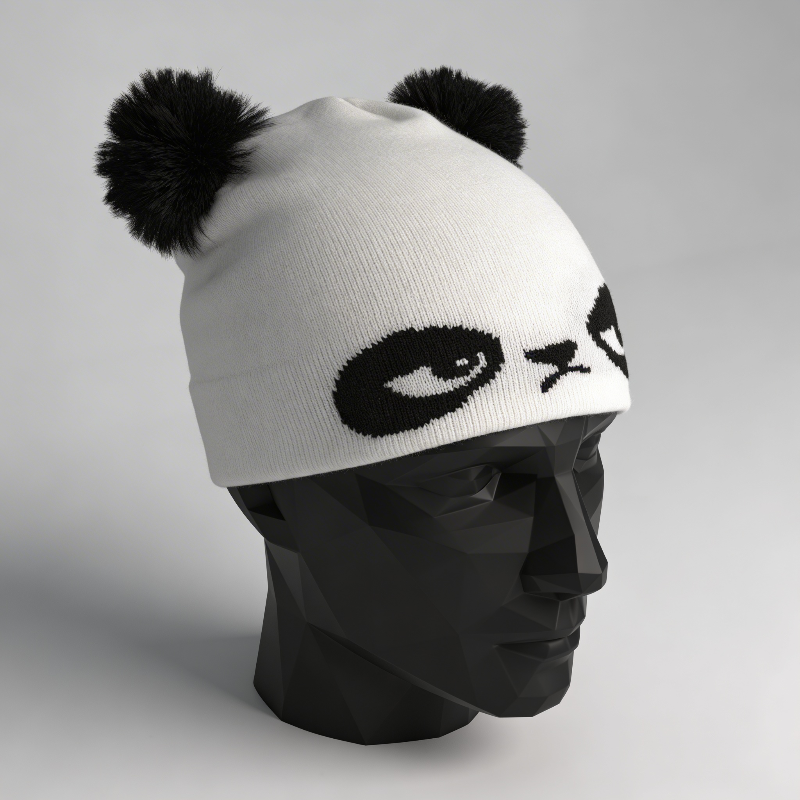 White beanie with black panda design on a mannequin head against a gray background