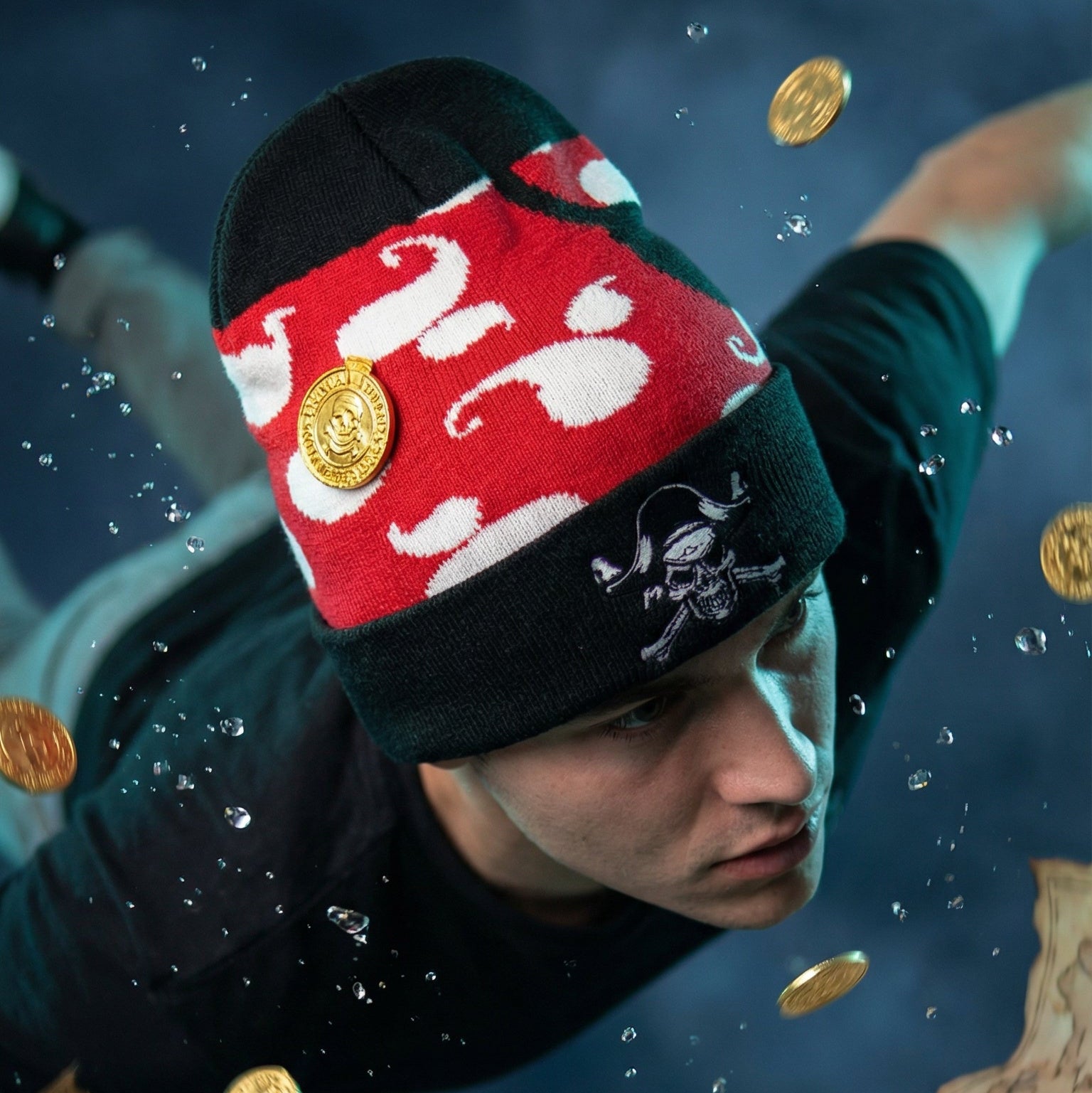 Person wearing a red and black hat with gold coins and treasure map in the air