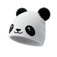 White beanie with panda face design on a gray background