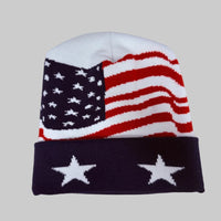 knitted beanie with American flag design on a white background