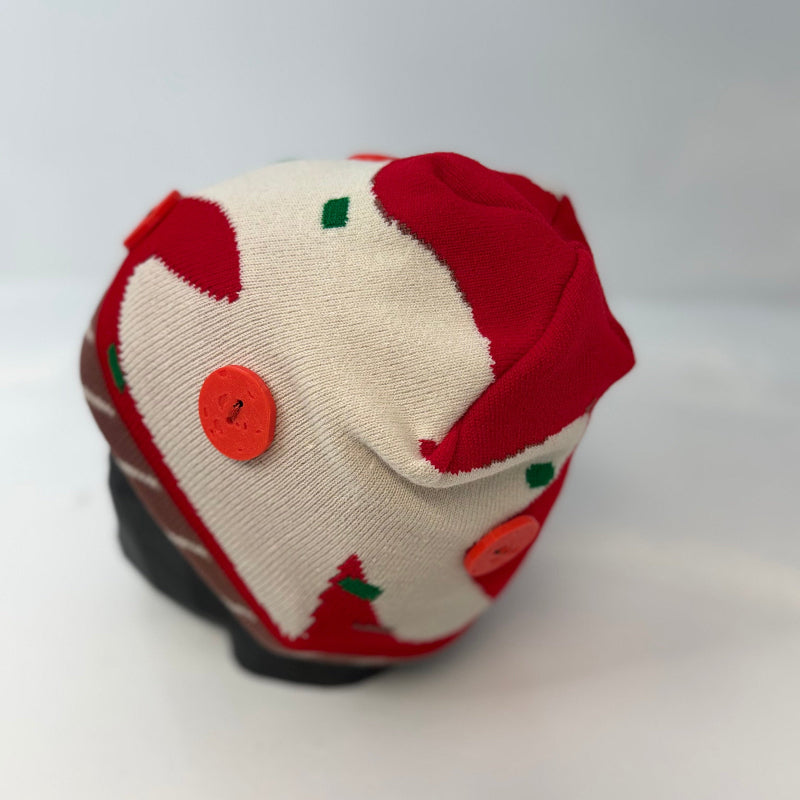 Pizza beanie with red and white pattern on a light gray background