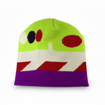 Colorful beanie with geometric patterns on a white background