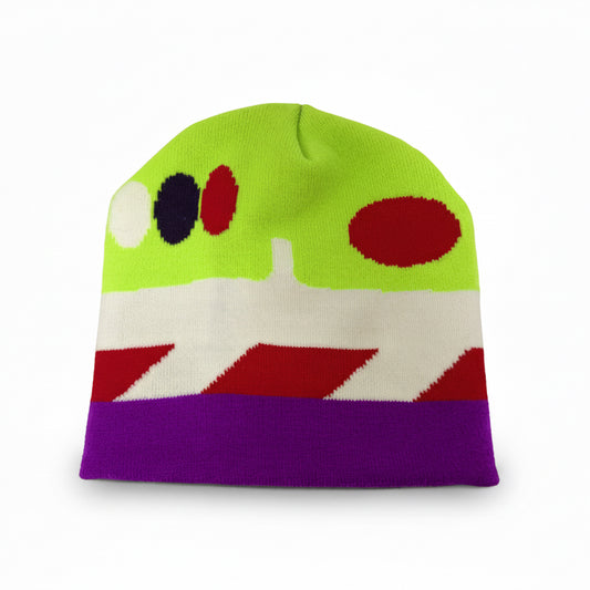 Colorful beanie with geometric patterns on a white background