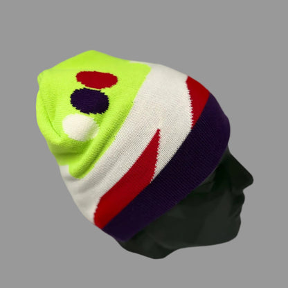 Colorful beanie with a mannequin head on a gray background