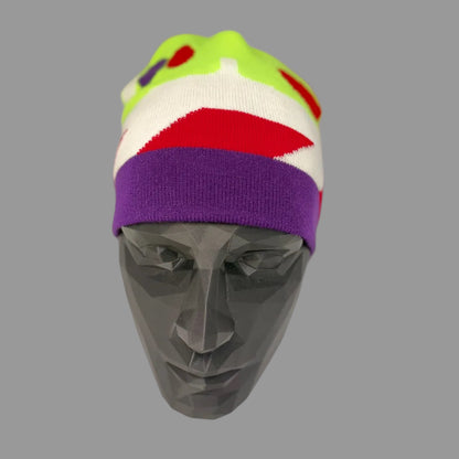 Colorful beanie on a mannequin head against a neutral background