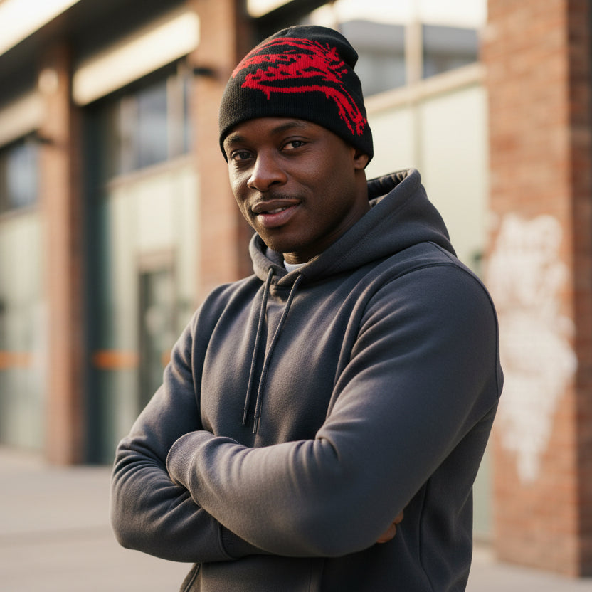 Black and red beanie on a black mannequin head against a white background