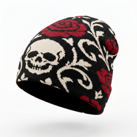 Black beanie with skull and rose pattern on a white background