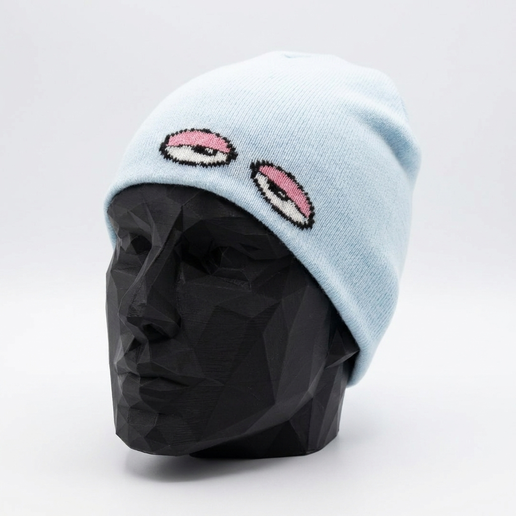 Light blue beanie with embroidered lips on a black mannequin head against a white background