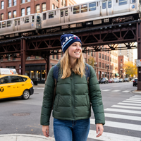 woman wearing chicago themed beanie