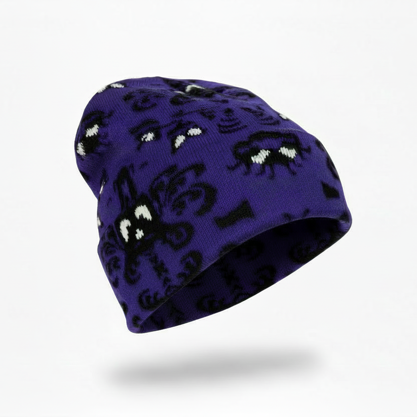 Purple beanie with black and white pattern on a white background
