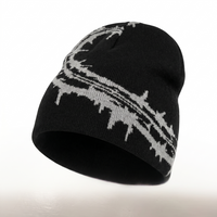 Black beanie with grey razor wire pattern on a white background