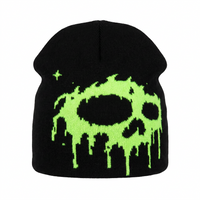 black beanie with neon green skull dripping slime 
