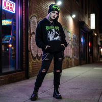goth girl wearing toxic slime beanie in alley 