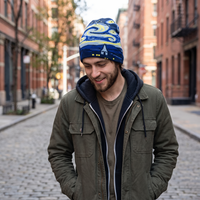 Starry Night beanie on man in green jacket 