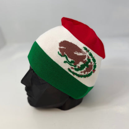 Knitted hat with Mexican flag design on a mannequin head against a white background