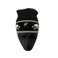 Black beanie with skull designs on a white background