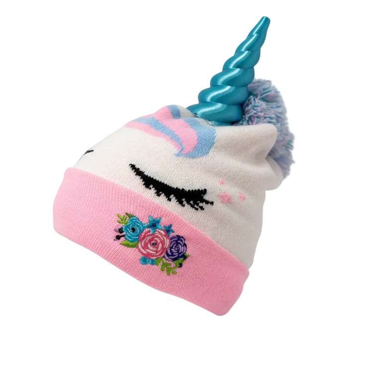 Unicorn-themed beanie with a blue horn and pink band on a white background